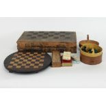 A leather chess and backgammon board, with simulated book spine,