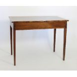An Edwardian mahogany writing table,