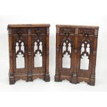 A pair of Victorian gothic oak prayer desks, each carved twin pierced arches to the front,