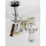 A matched silver dressing table set, various dates and makers, including hand mirror, hair brush,