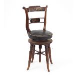 A Regency adjustable harp chair, the back with brass inlaid scroll work,