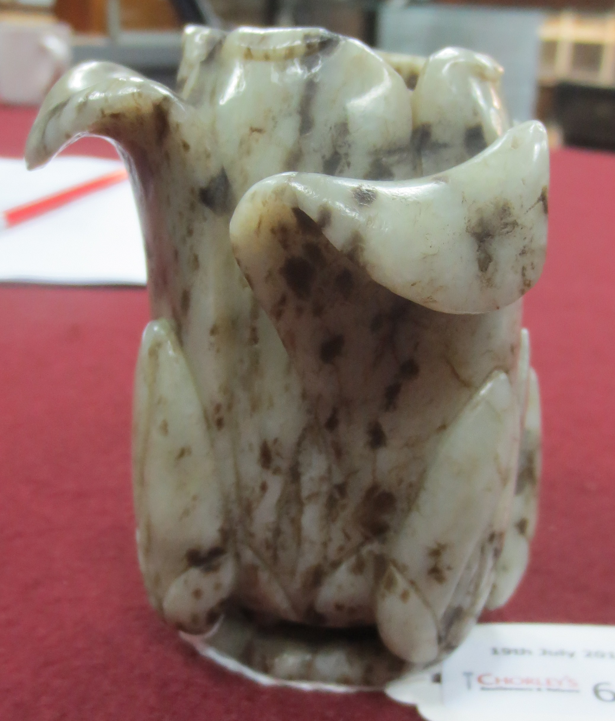 A Chinese jade vase of magnolia form, Qing dynasty, naturalistically modelled, 9. - Image 7 of 8