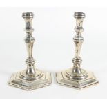 A pair of George I style silver candlesticks, JHO, London 1976, of knopped hexagonal shape,