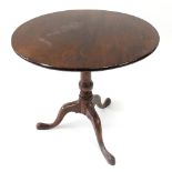 A George III mahogany tripod table, with circular top,