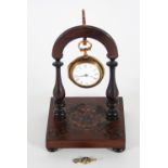 A George III pair cased pocket watch on stand, the outer case decorated with a figure of a gardener,