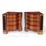 A pair of George III satinwood corner commodes with serpentine fronts,