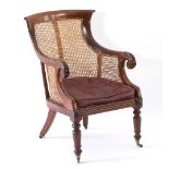 An early Victorian mahogany framed bergère chair, circa 1840,