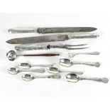 A small quantity of silver comprising a silver toddy ladle, two carving knives and a carving fork,