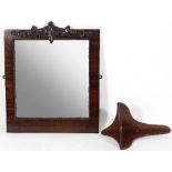 A 19th Century walnut wall mirror with carved frieze and gadrooned border,