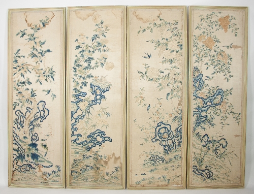 Four Chinese needlework panels of birds in flowering branches,