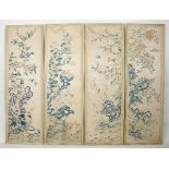 Four Chinese needlework panels of birds in flowering branches,