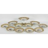 An English pottery dessert service of eleven pieces, Bouquet pattern,