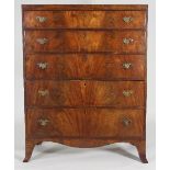 A 19th Century mahogany chest of five long drawers on splay feet, in two sections, 105.