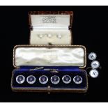 A cased set of six cut glass and amethyst dress buttons,