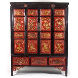 A Chinese lacquer cabinet, of four long panel doors above three short drawers,