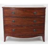 A 19th Century mahogany bowfront chest of three long drawers on splay feet, 102.