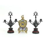 A Continental gilt metal and champlevé enamel mantel clock fitted an eight-day striking movement,