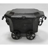 A Victorian tôle peinte coal trolley, with domed hinged lid,
