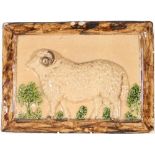 A Yorkshire lead-glazed earthenware plaque, moulded in relief with a ram in a pastoral setting,