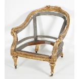 A carved giltwood framed open armchair, in need of complete re-upholstery,