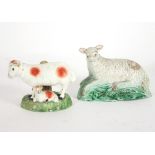A Staffordshire pearlware model of a recumbent sheep, circa 1780, and another of a ewe and lamb,