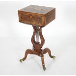 A walnut work stand, the box crossbanded with burr walnut and fitted with seven lidded compartments,