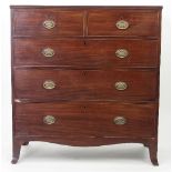 A 19th Century mahogany chest of two short over three long drawers on splay feet, 107.