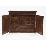 A William and Mary walnut cabinet,