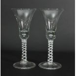 A pair of George III style drinking glasses, each with trumpet shaped bowl,