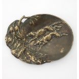 A bronze pin tray decorated in relief with two hunting dogs flushing a pheasant from the