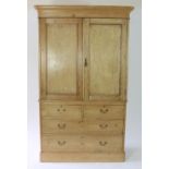 A Victorian pine linen press,