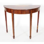 A satinwood table of 18th Century design, the top inlaid a central batwing patera,