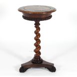 A William IV rosewood jardinière table, the circular top with lift out lid,