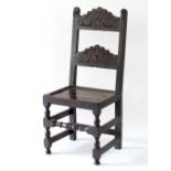 A 17th Century oak chair,