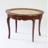 A Louis XVI style oval table with marble top and gilt metal mounts, 77.