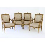 A set of four Louis XVI style gilt framed salon chairs,