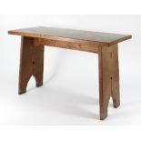 Manner of Liberty & Co: An Arts and Crafts oak table in the manner of Liberty & Co.
