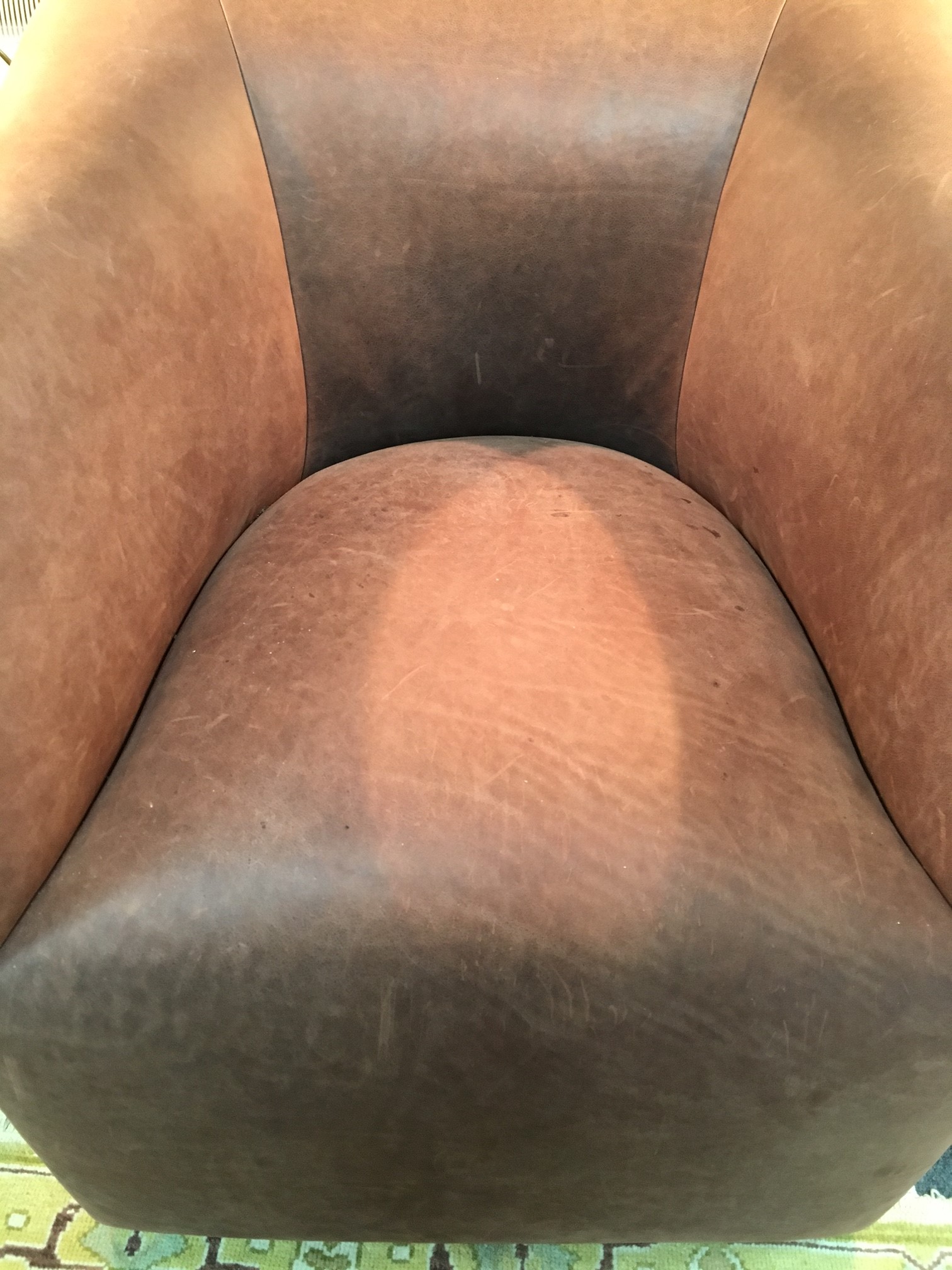 A brown leather upholstered tub armchair by J Robert Scott and a matching foot stool/see - Image 3 of 5