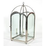 A large chrome and glass hall lantern with four central lights,