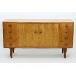 A Gordon Russell sideboard with name plaque, 160cm diameter, 48.