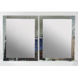 A pair of modern wall mirrors with mirror tile frames,