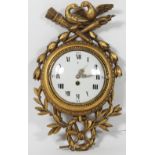 A Louis XV style wall clock, with giltwood surround of birds, torches and foliage,