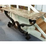 A pair of very large wrought iron console tables,