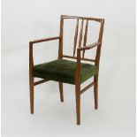 A Gordon Russell armchair with upholstered seat