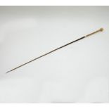 A yellow metal mounted riding crop, with reeded sphere knop and collar, marked to collar and knop,