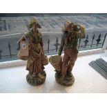 A pair of large Royal Dux figures, Dutch fisher girl and boy carrying baskets, pink triangle mark to