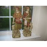 A large pair of Royal Dux figures of a shepherd and shepherdess with sheep and goat, pink triangle