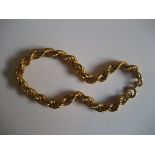 A 9ct gold foldover bracelet, stamped 375, 5.1g.