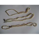 Three  pearl style  necklaces, one marked 835 to clip, another 375 to clip (3).