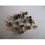 A pair of 15ct gold pearl earrings, another pair similar, a pair of 15ct gold turquoise earrings,